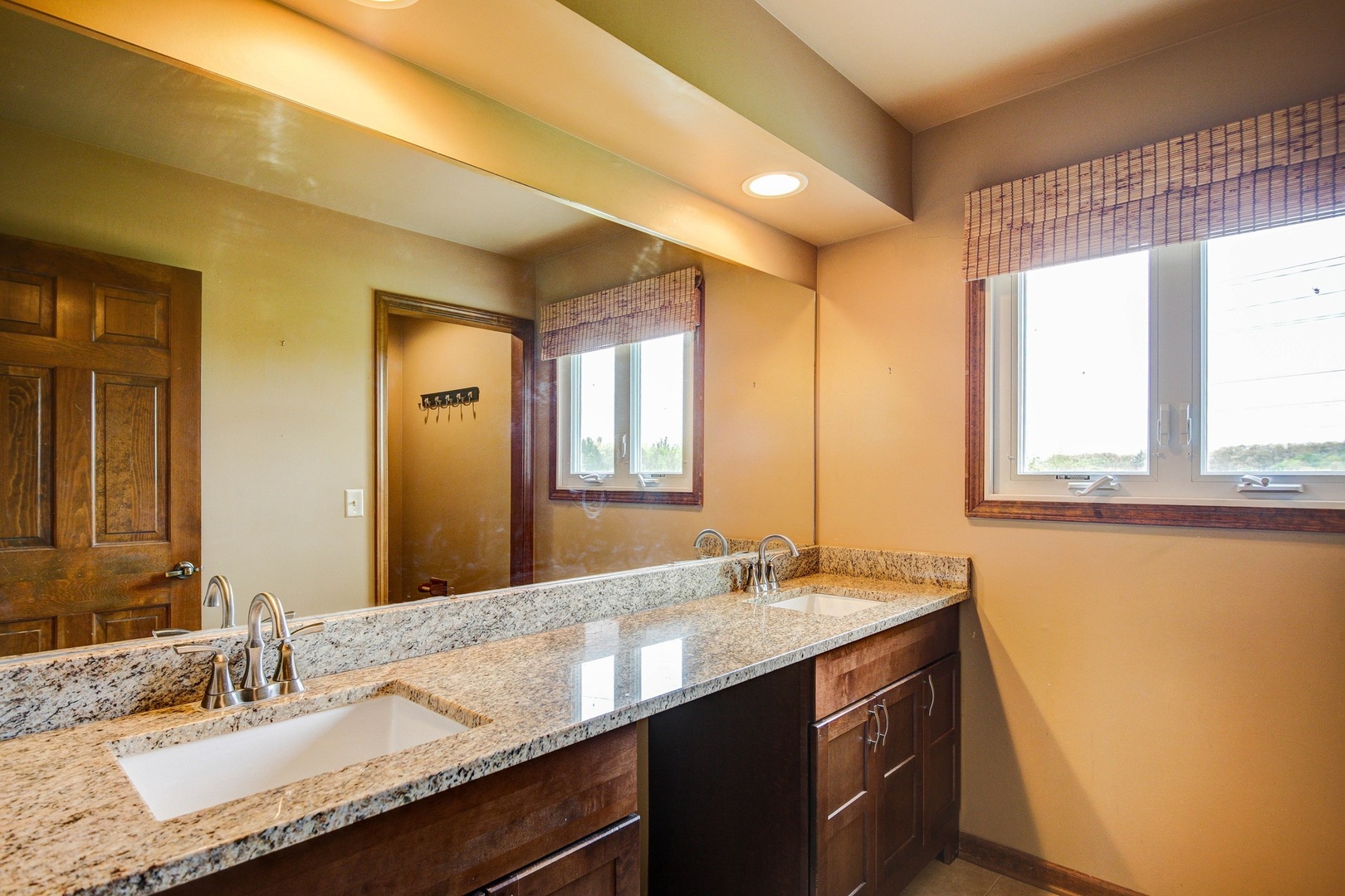 1945 Slippery Rock Road Naperville, IL 60565 - Photo 17 of 35 a bathroom with a granite countertop sink and a mirror