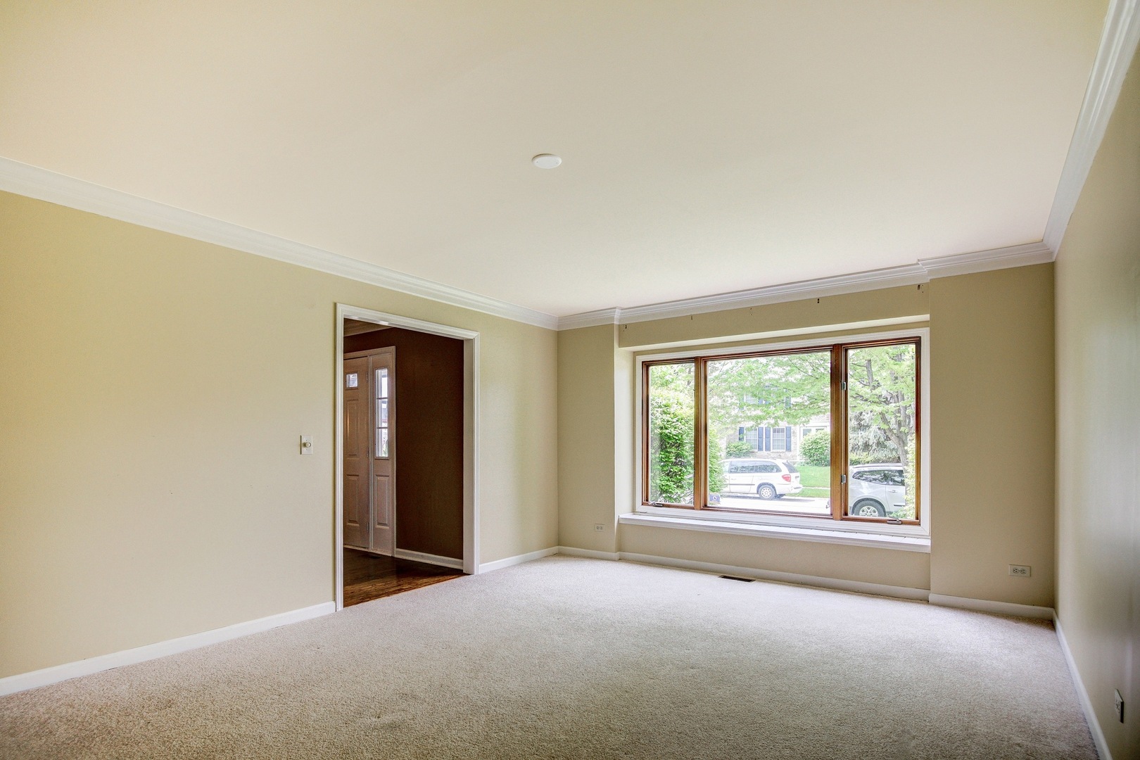 1945 Slippery Rock Road Naperville, IL 60565 - Photo 3 of 35 an empty room with windows and closet