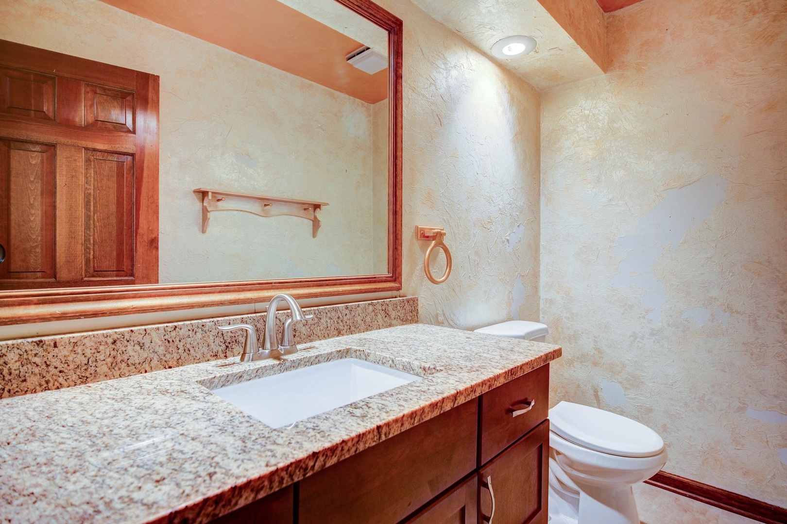 1945 Slippery Rock Road Naperville, IL 60565 - Photo 23 of 35 a bathroom with a granite countertop sink and a mirror