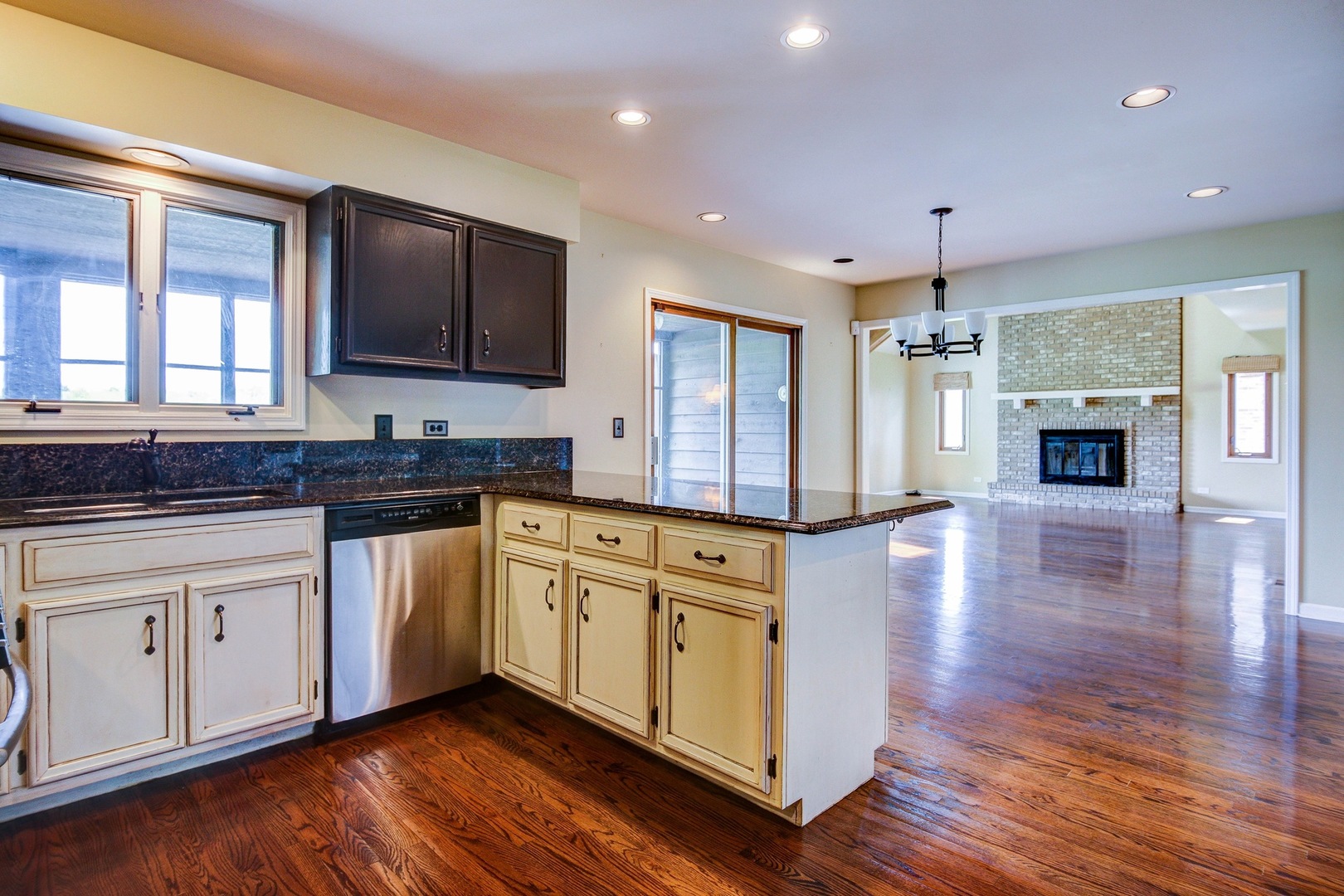 1945 Slippery Rock Road Naperville, IL 60565 - Photo 6 of 35 a kitchen with stainless steel appliances granite countertop a stove a sink and a microwave