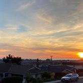 a view of car parked on the roadside