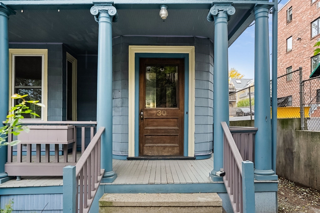 30 Walnut Street Somerville, MA 02143 - Photo 3 of 4 front view of a house with a window