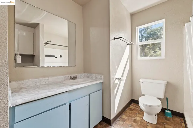 a view of a bathroom with a toilet