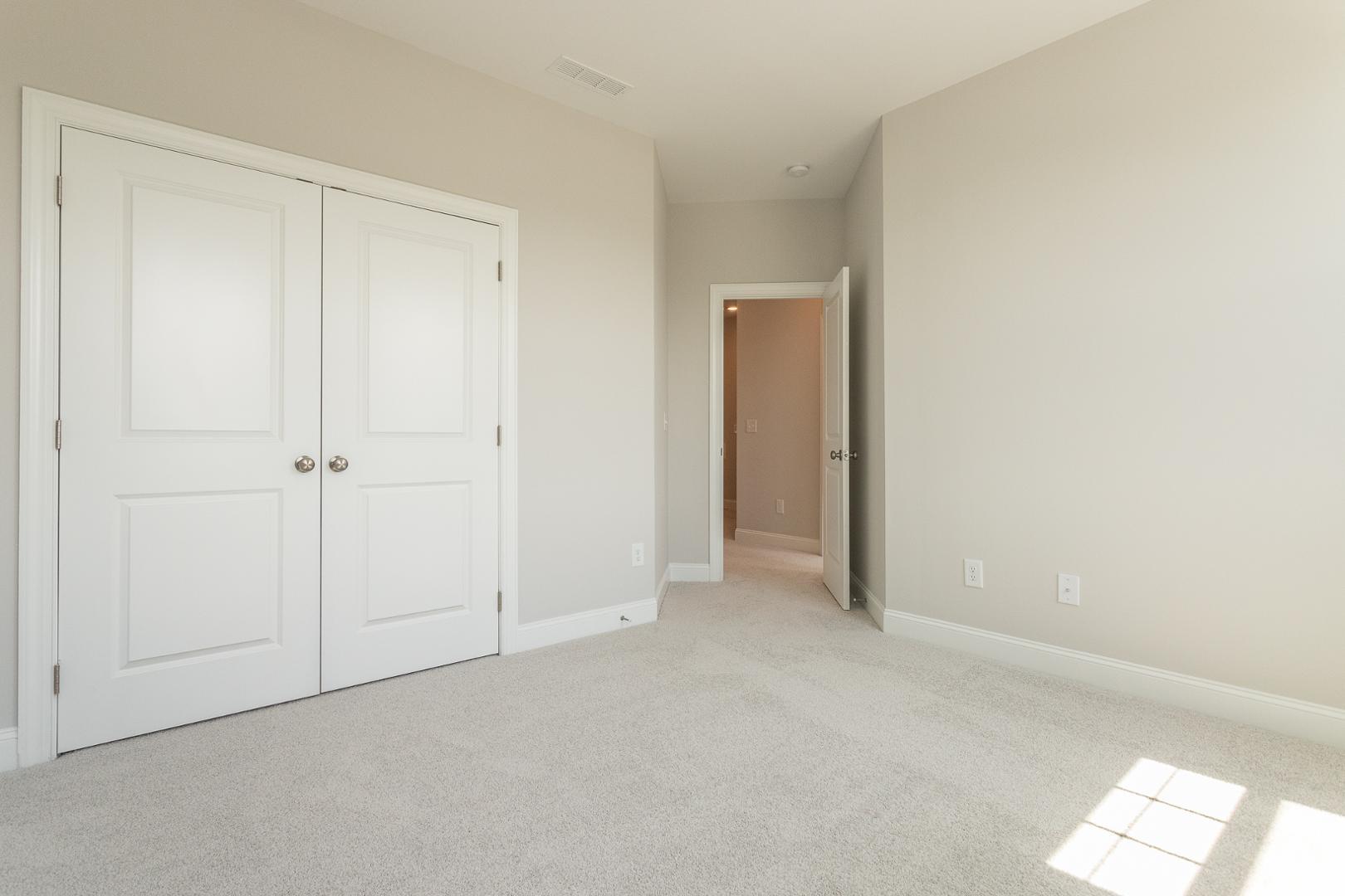 8421 Zinc Autumn Path Raleigh, NC 27615 - Photo 12 of 33 an empty room with windows