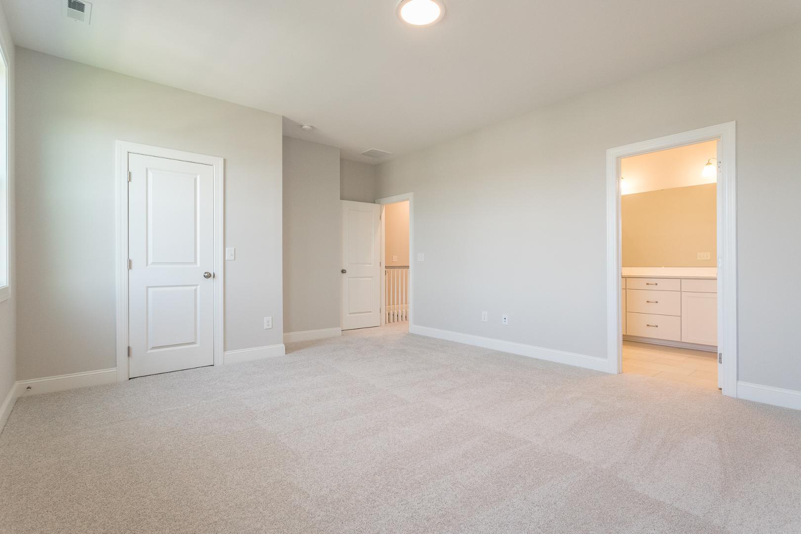 8421 Zinc Autumn Path Raleigh, NC 27615 - Photo 16 of 33 a view of an empty room and a window