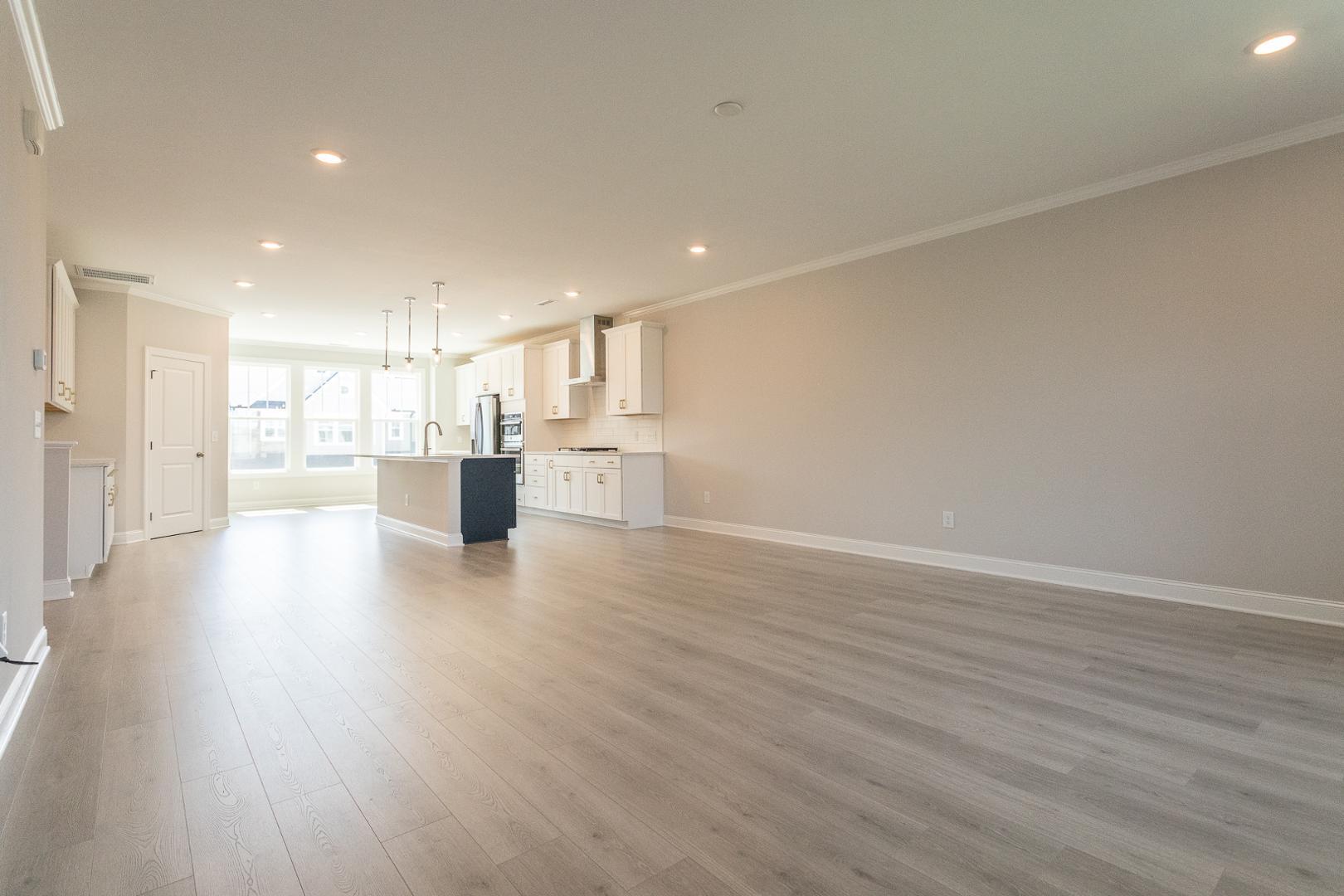8421 Zinc Autumn Path Raleigh, NC 27615 - Photo 22 of 33 a view of kitchen and wooden floor