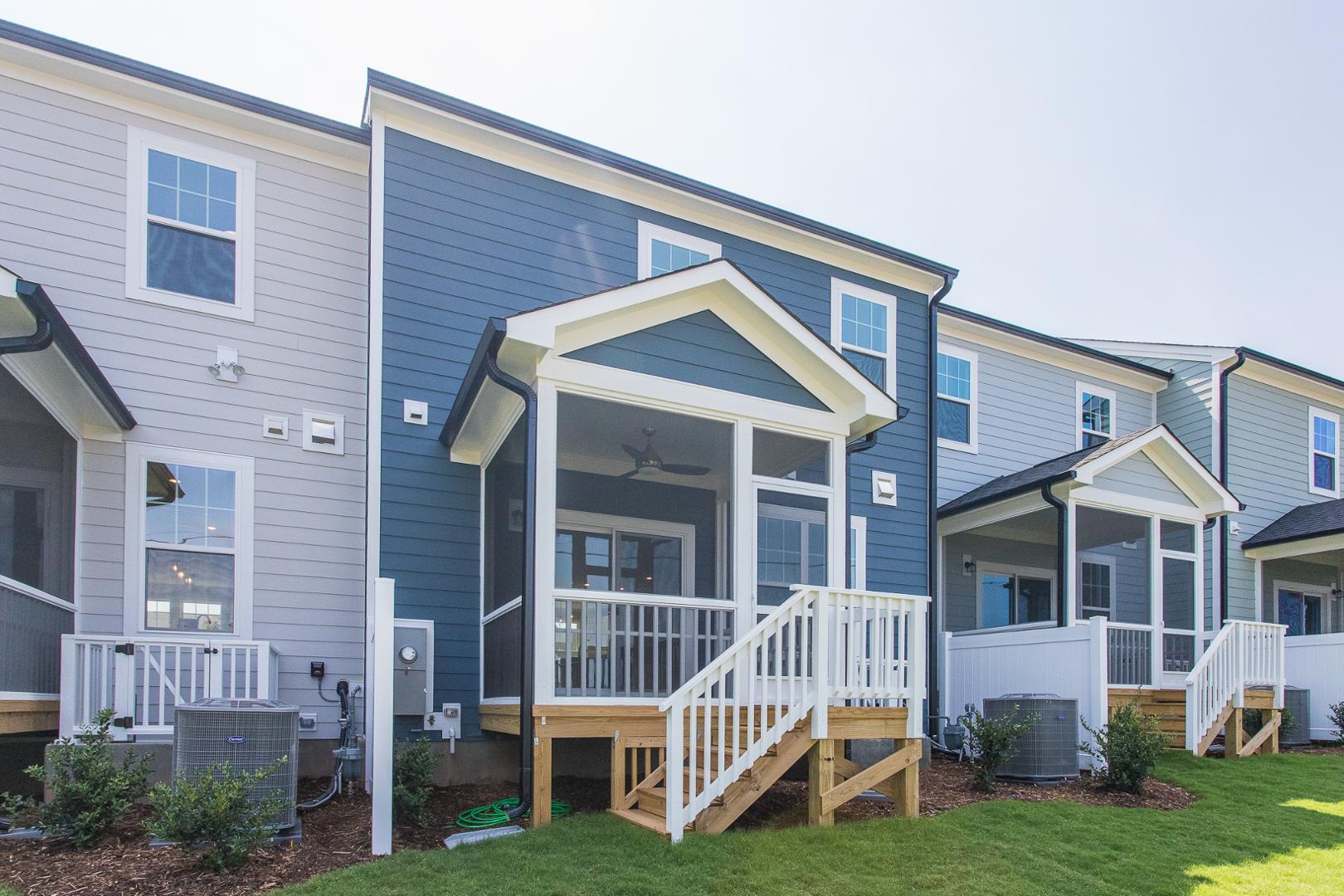 8421 Zinc Autumn Path Raleigh, NC 27615 - Photo 31 of 33 a front view of a house with garden and porch