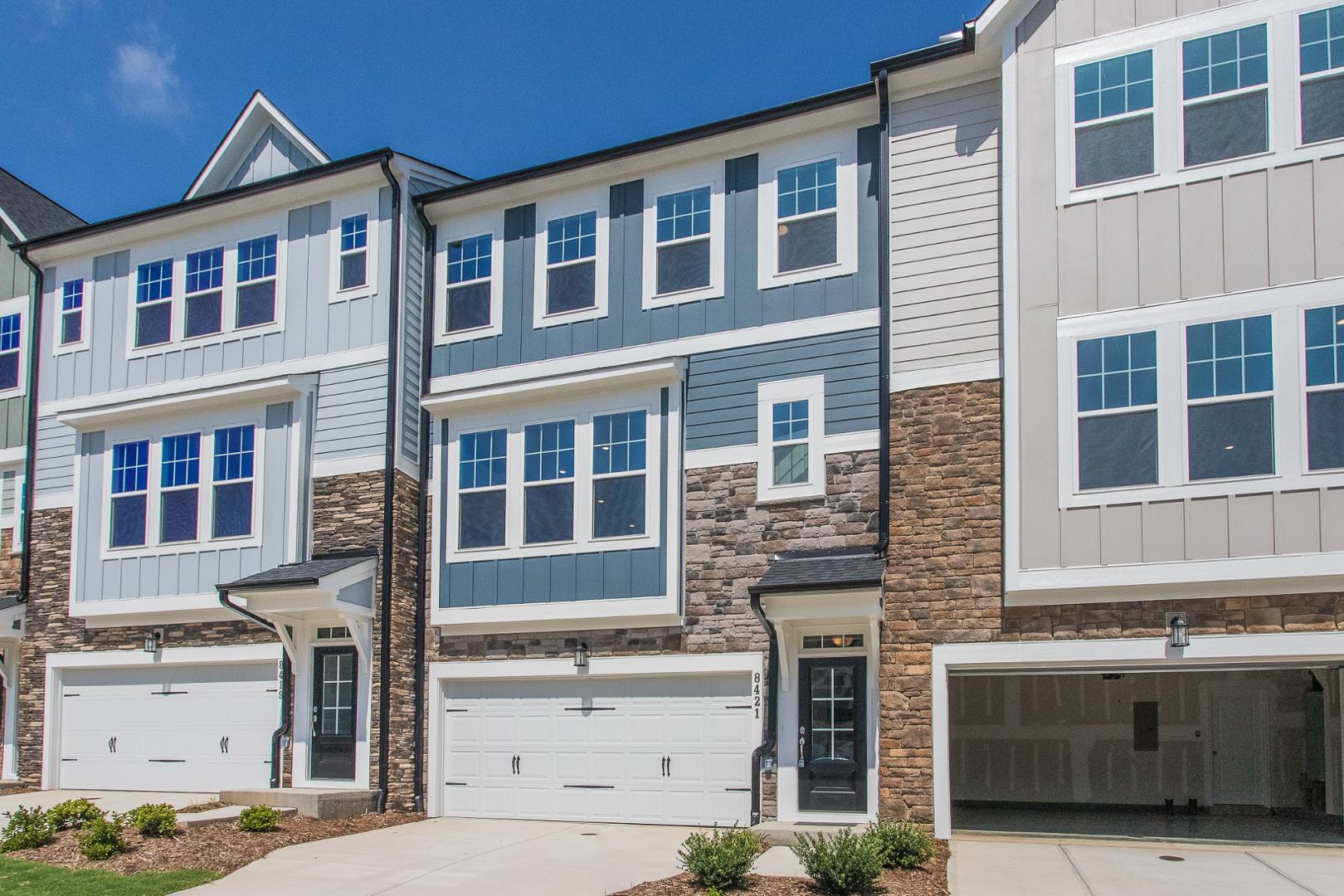 8421 Zinc Autumn Path Raleigh, NC 27615 - Photo 32 of 33 a front view of a house with a yard