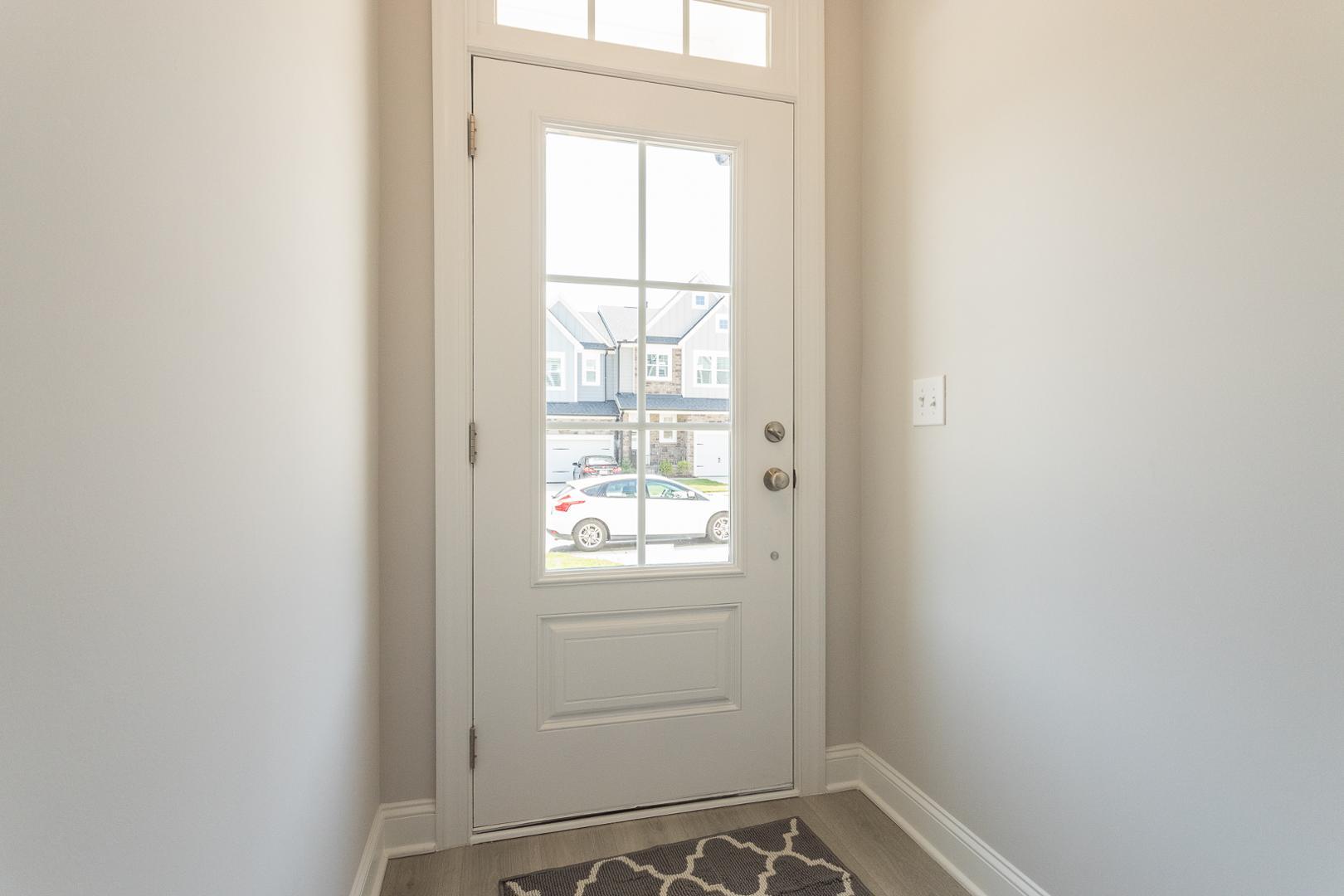 8421 Zinc Autumn Path Raleigh, NC 27615 - Photo 9 of 33 a view of an empty room and window
