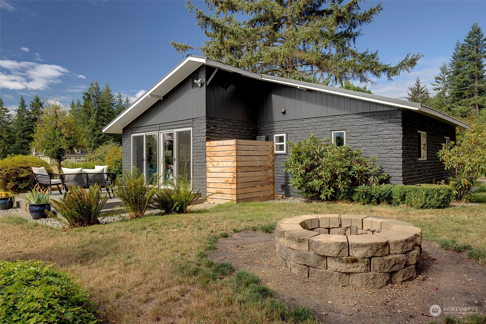 29316 Lake Chaplain Road Monroe, WA 98272 - Photo 12 of 18 front view of house with table and chairs in patio