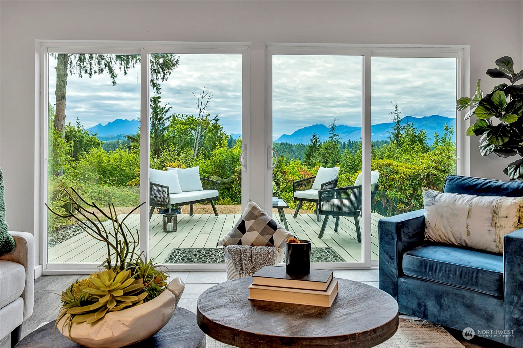 29316 Lake Chaplain Road Monroe, WA 98272 - Photo 3 of 18 a living room with furniture and a large window