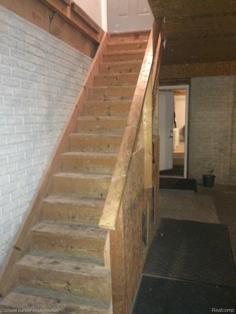 4064 East Coldwater Road Flint, MI 48506 - Photo 31 of 53 Garage Entry to Main Floor and Basement