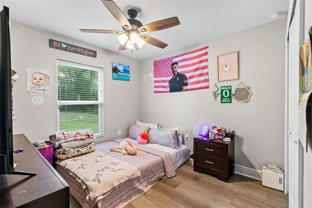 a bathroom with a sink mirror and toilet