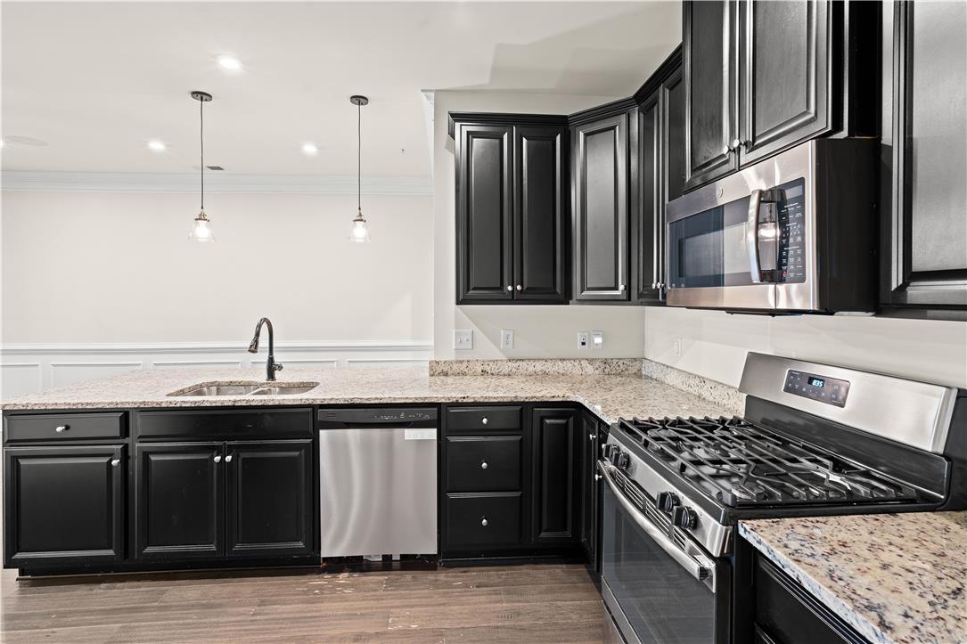 4758 Rafi Road Easton, PA 18045 - Photo 11 of 55 Granite counters and stainless steel appliances complete this well-appointed kitchen, ready for culinary creations.