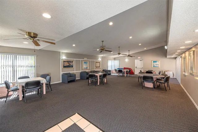 a room with furniture and a large window