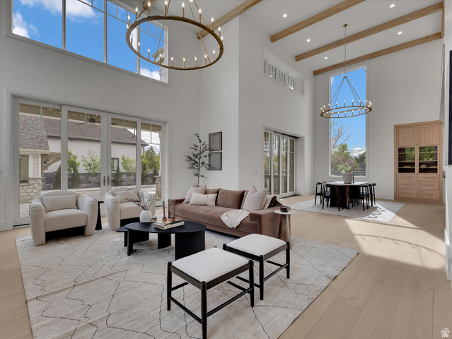 13216 Telemark Lane Draper, UT 84020 - Photo 7 of 41 Living area featuring a chandelier, light wood-style floors, and plenty of natural light