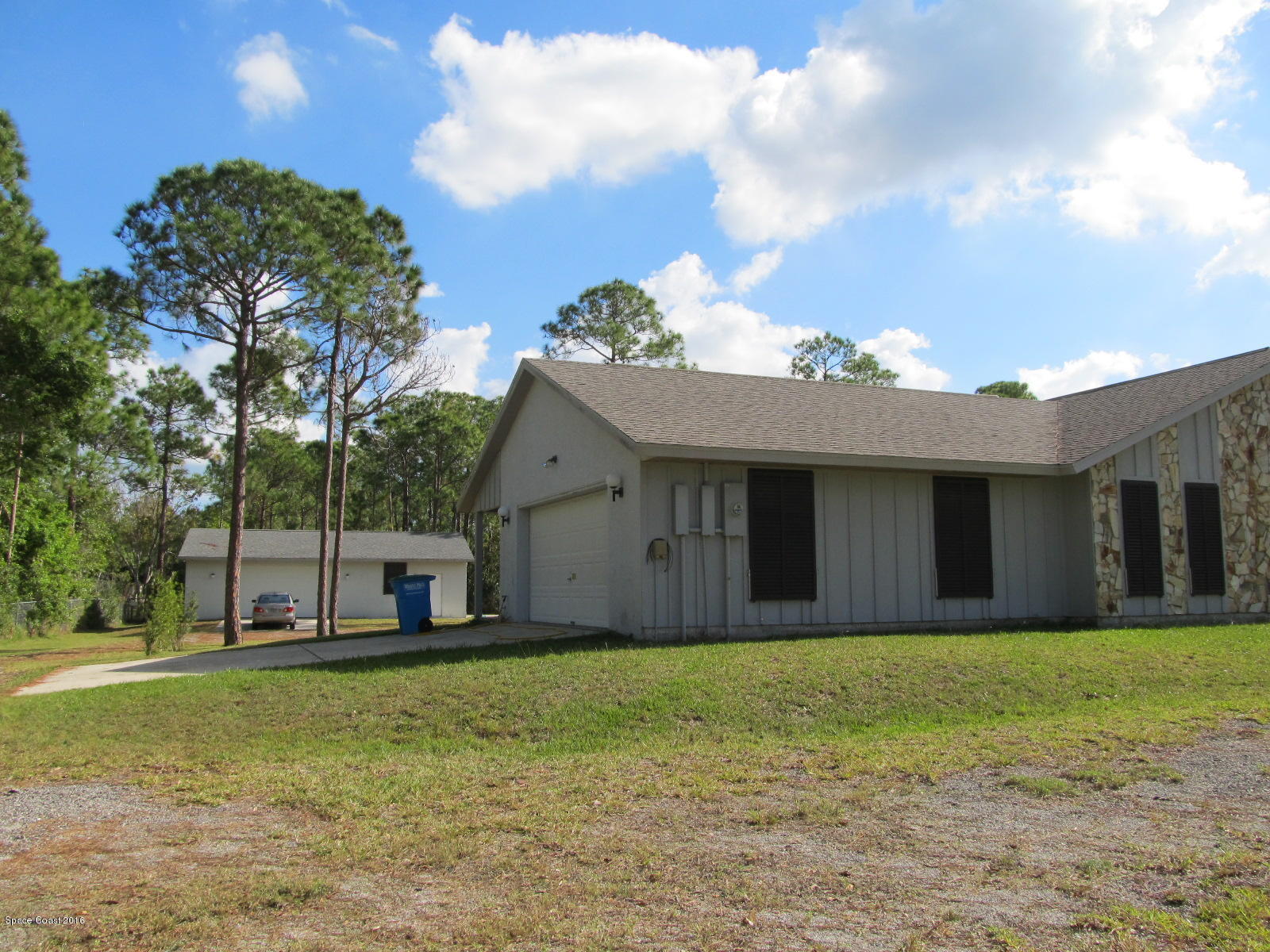 3775 Corey Road Grant Valkaria, FL 32950 - Photo 12 of 12 a house view with a garden space