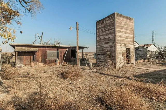 a view of a house with a roof deck