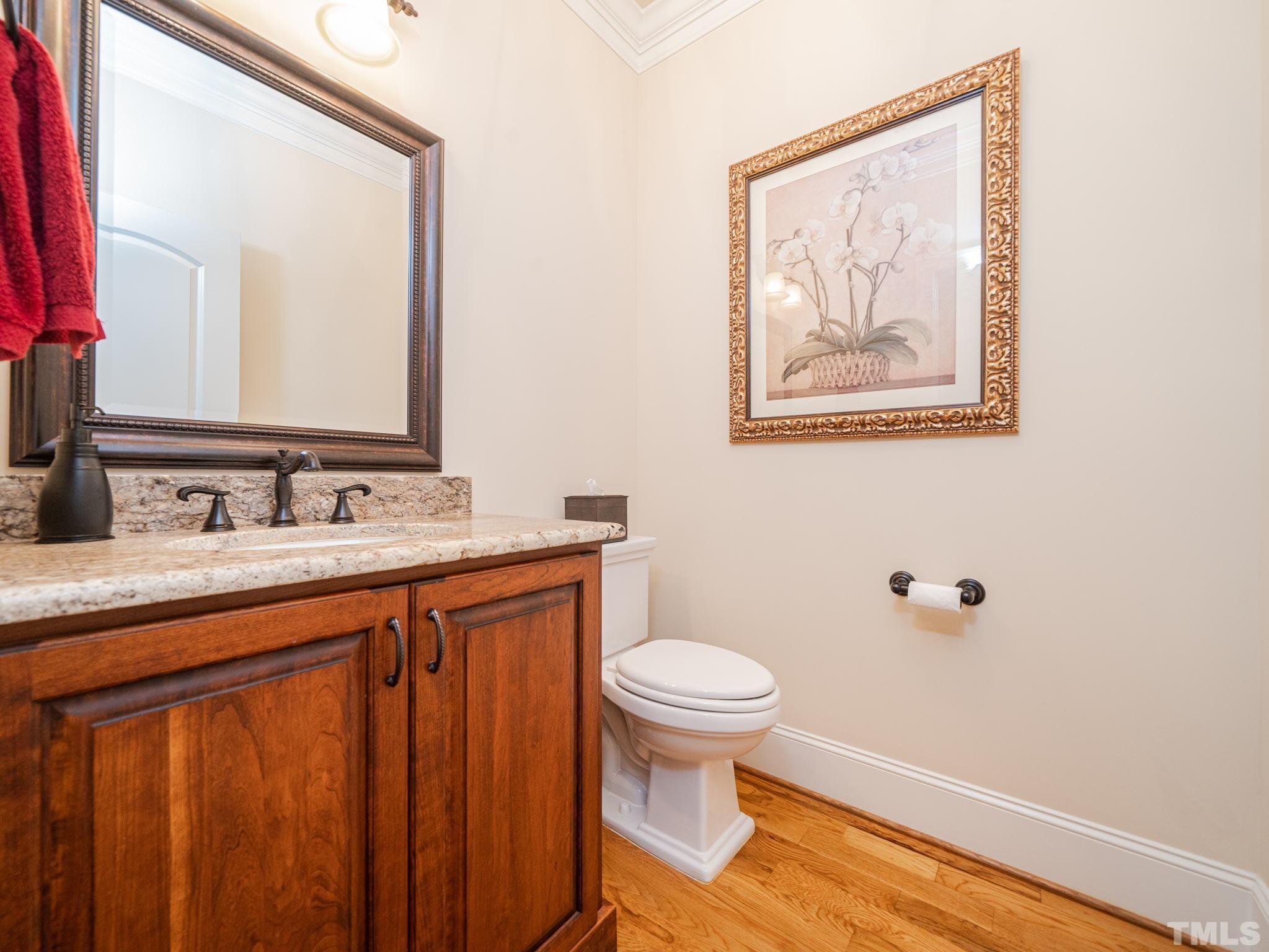 842 Cranbrook Road Raleigh, NC 27609 - Photo 17 of 39 a bathroom with a sink and a mirror