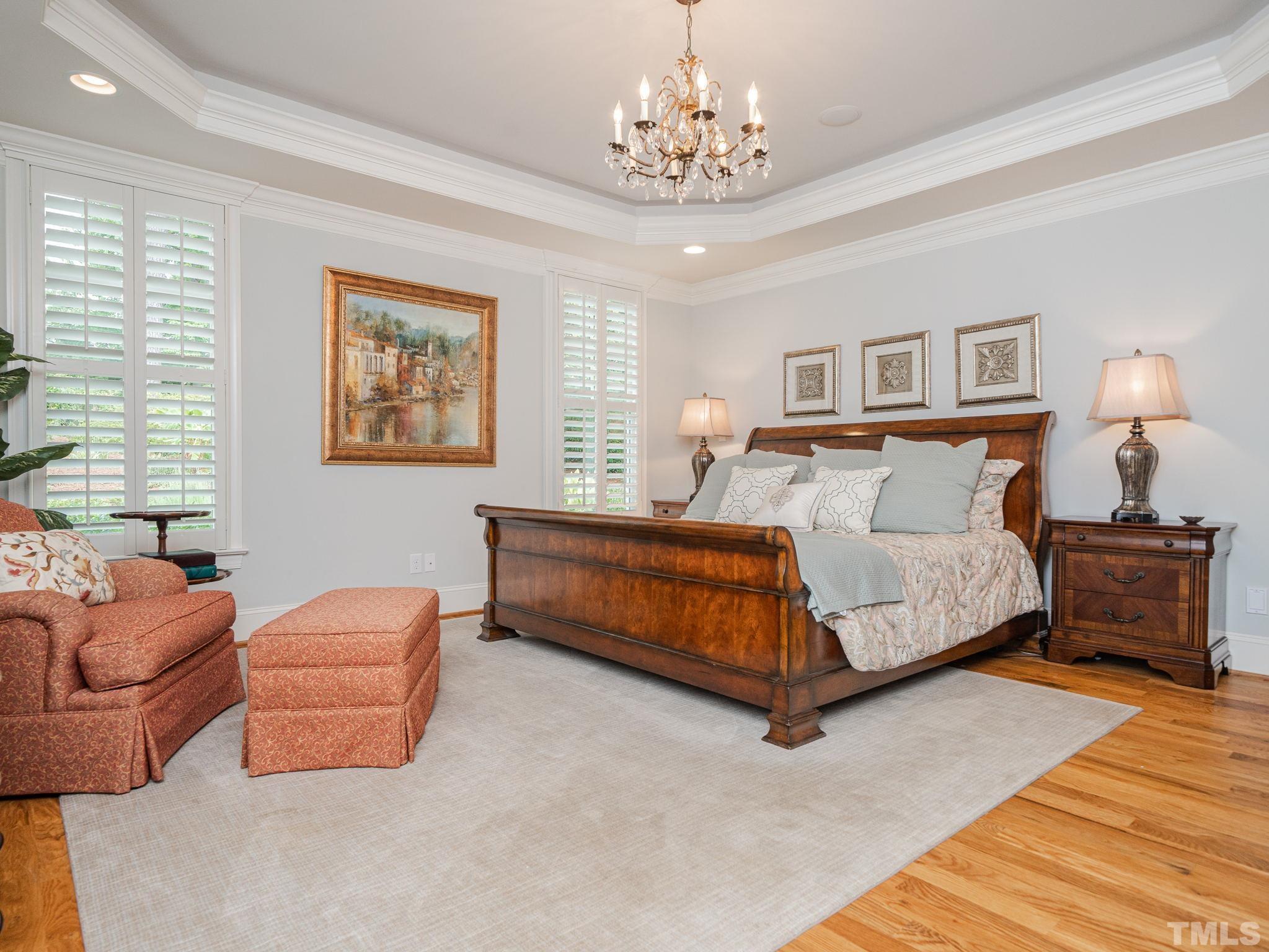 842 Cranbrook Road Raleigh, NC 27609 - Photo 20 of 39 a bedroom with a bed and window