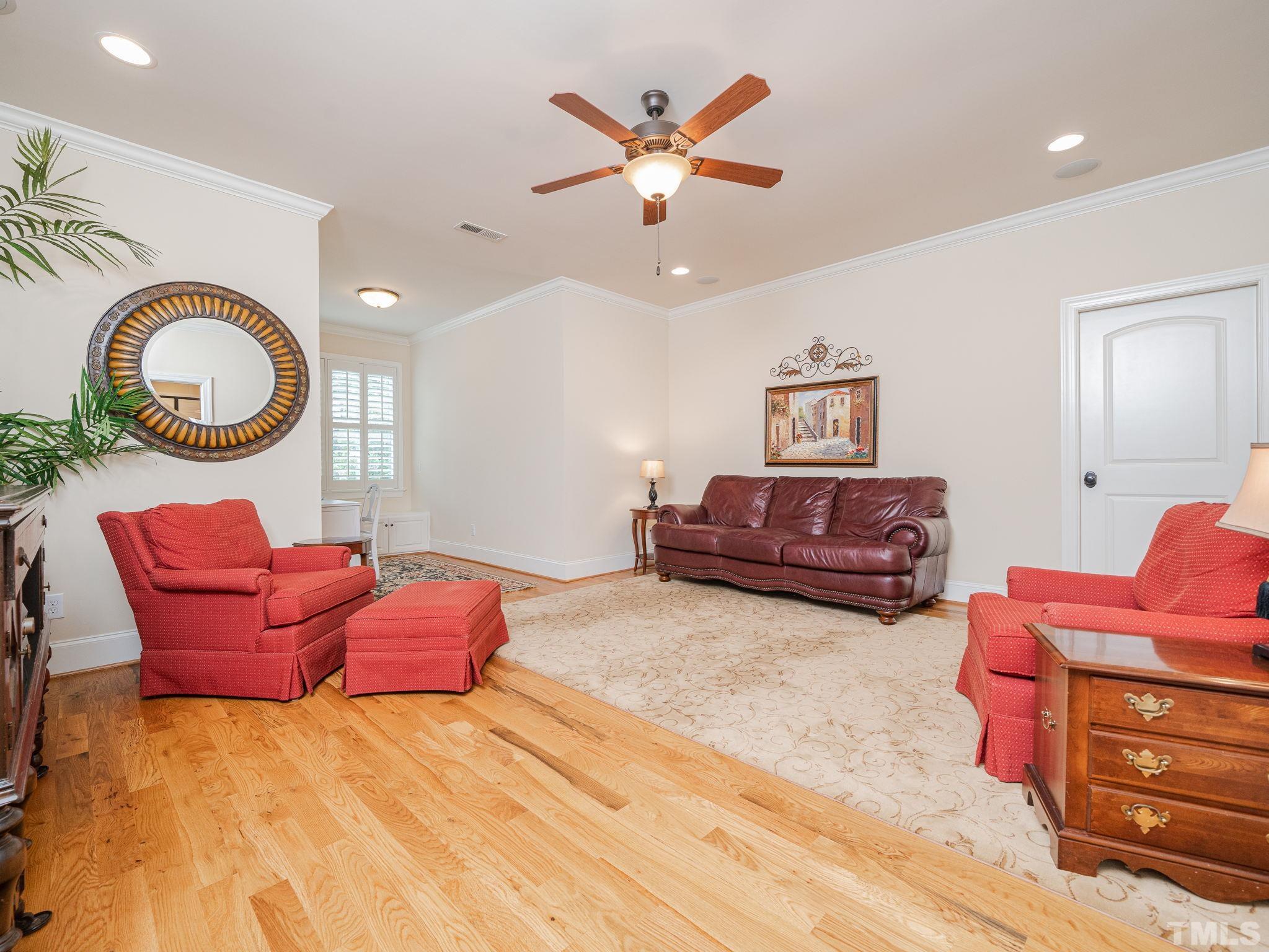 842 Cranbrook Road Raleigh, NC 27609 - Photo 31 of 39 a bedroom with furniture and a bed