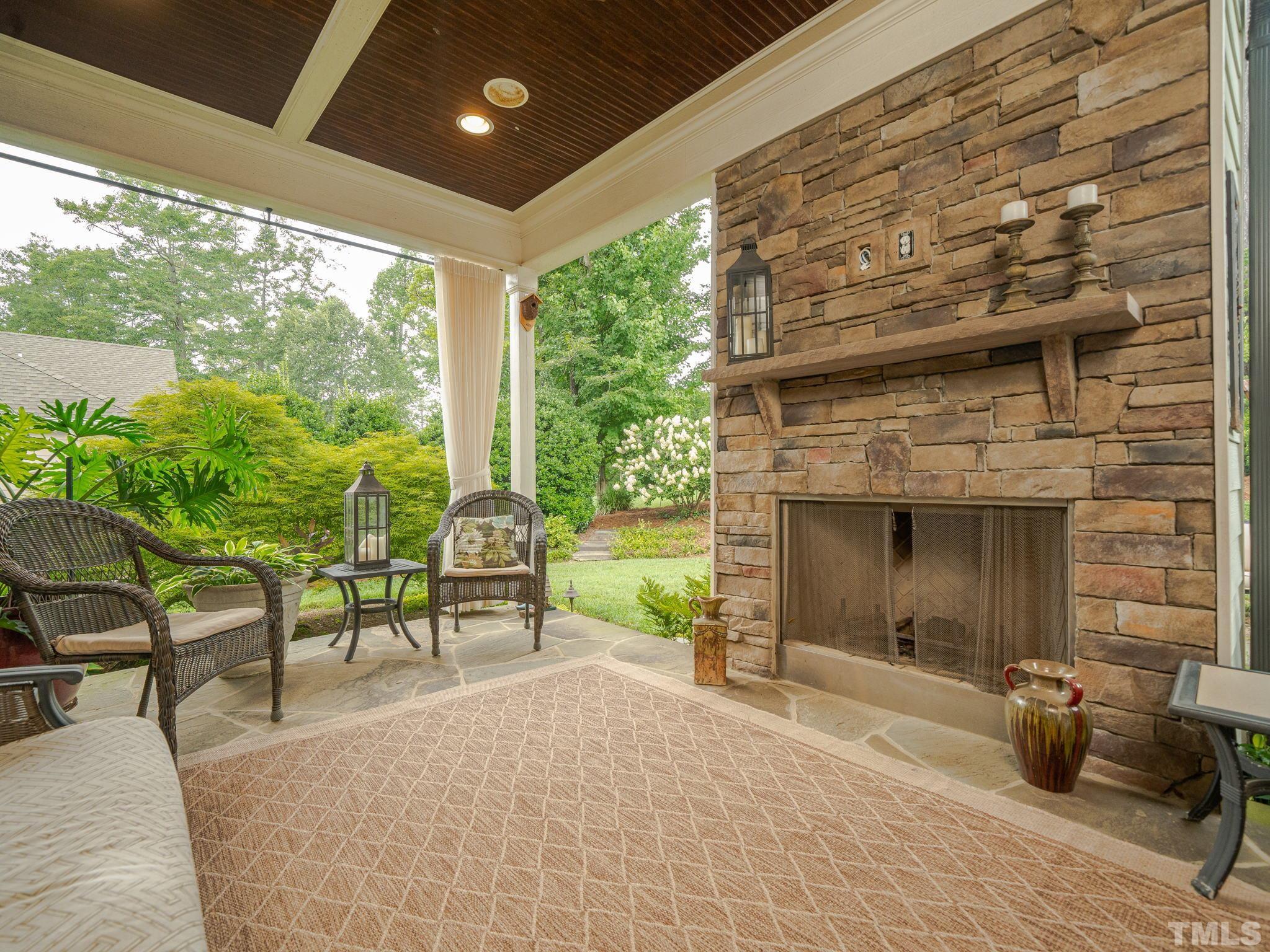 842 Cranbrook Road Raleigh, NC 27609 - Photo 34 of 39 a garden view with a seating space