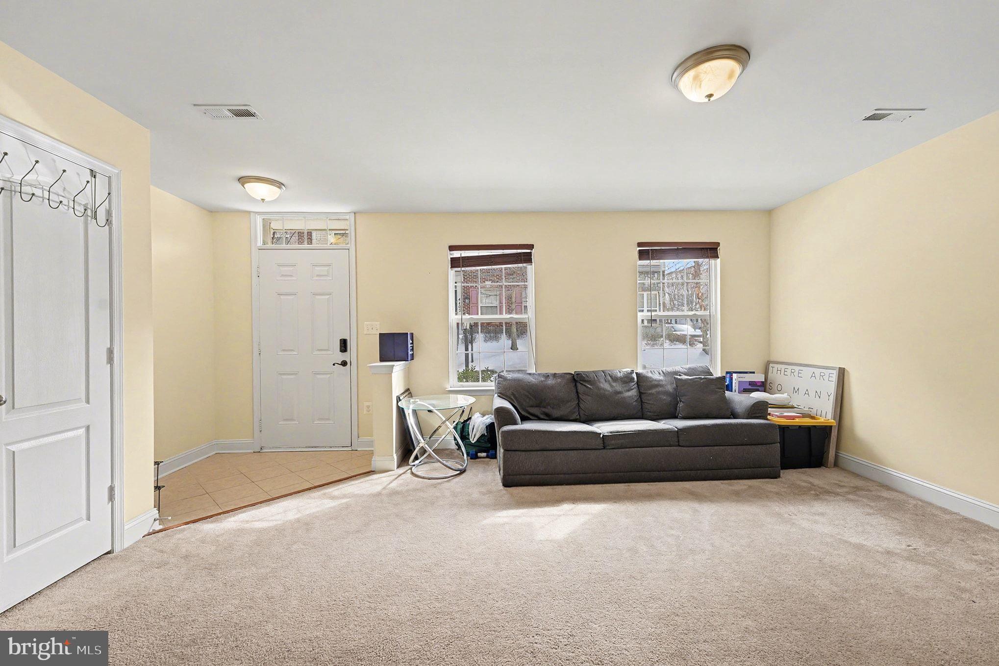 4440 Potomac Highlands Circle Triangle, VA 22172 - Photo 17 of 34 a living room with furniture and a window