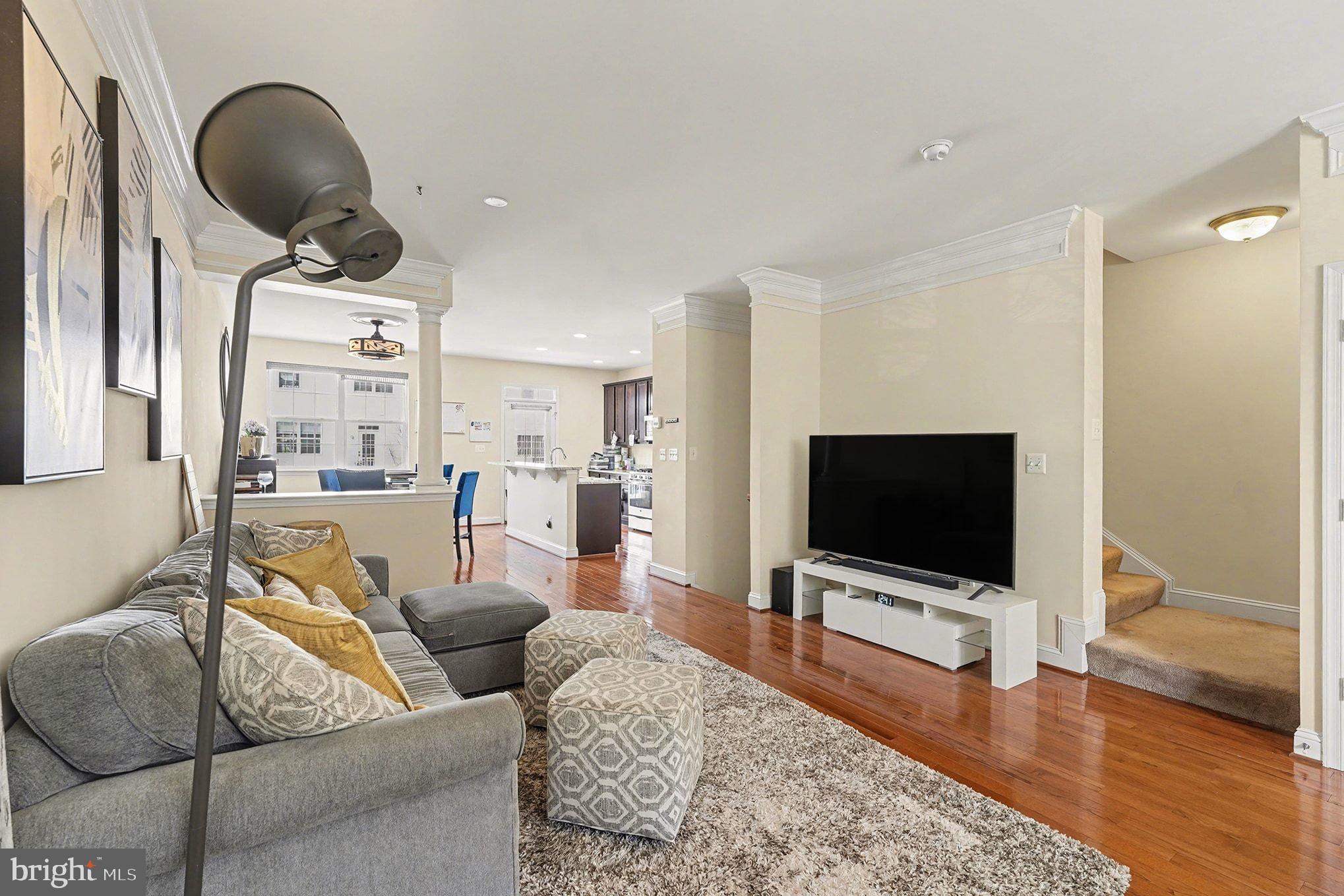 4440 Potomac Highlands Circle Triangle, VA 22172 - Photo 2 of 34 a living room with furniture and a flat screen tv