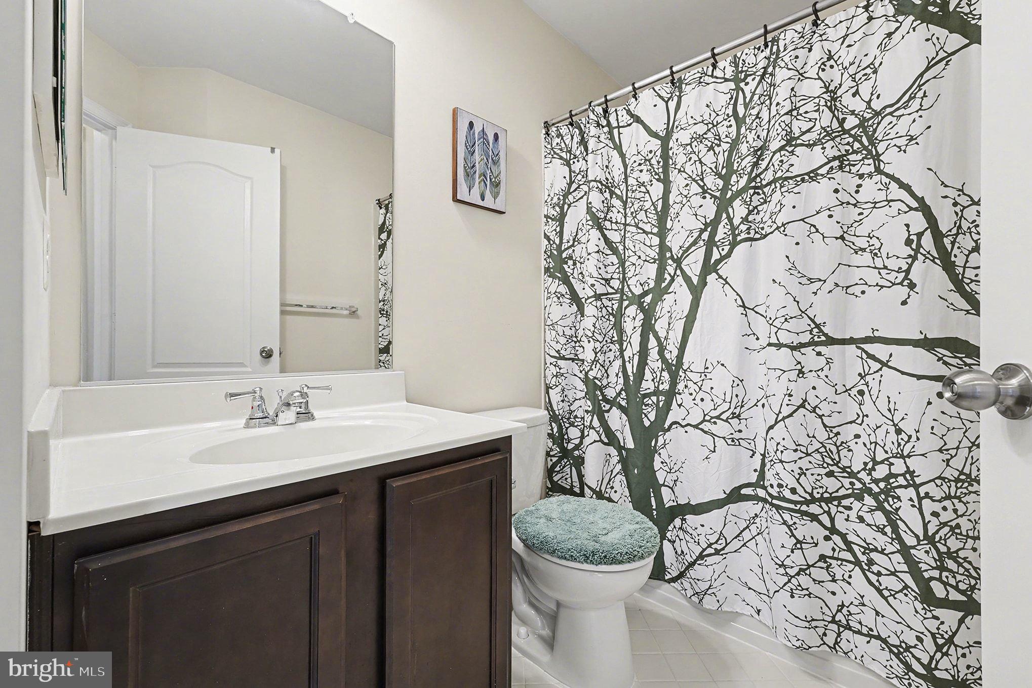 4440 Potomac Highlands Circle Triangle, VA 22172 - Photo 27 of 34 a bathroom with a sink and a toilet