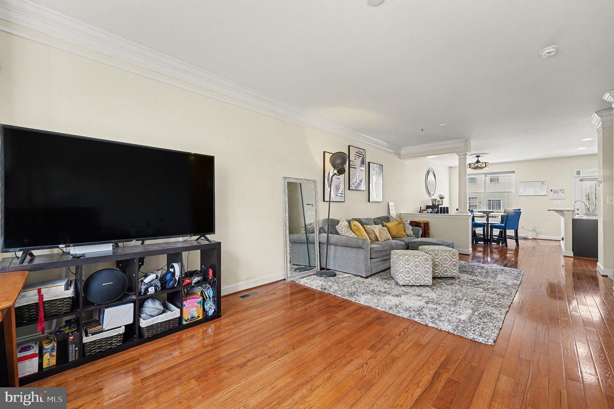 4440 Potomac Highlands Circle Triangle, VA 22172 - Photo 3 of 34 a living room with furniture and a flat screen tv