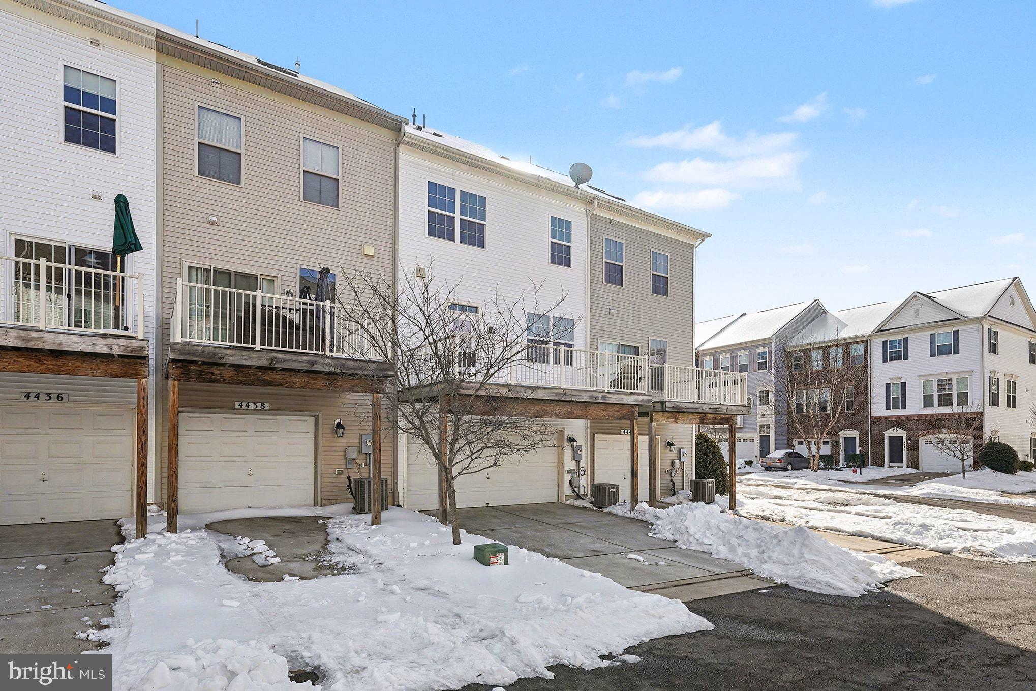 4440 Potomac Highlands Circle Triangle, VA 22172 - Photo 6 of 12 a front view of a building with balcony