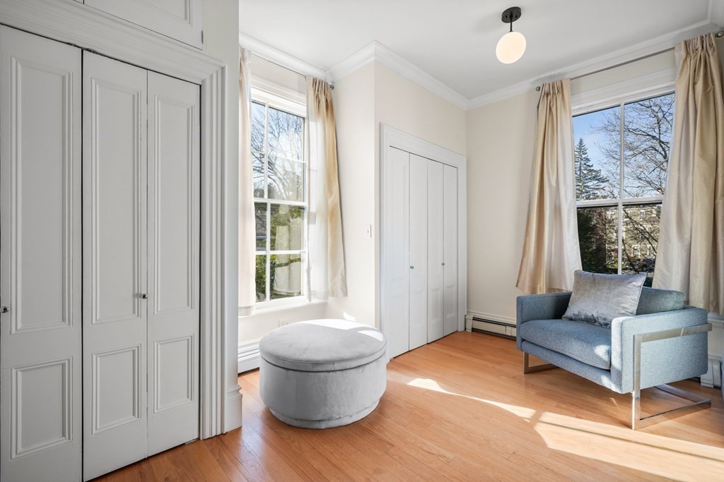 105 Eldredge Street Newton, MA 02458 - Photo 20 of 42 a living room with furniture and a window