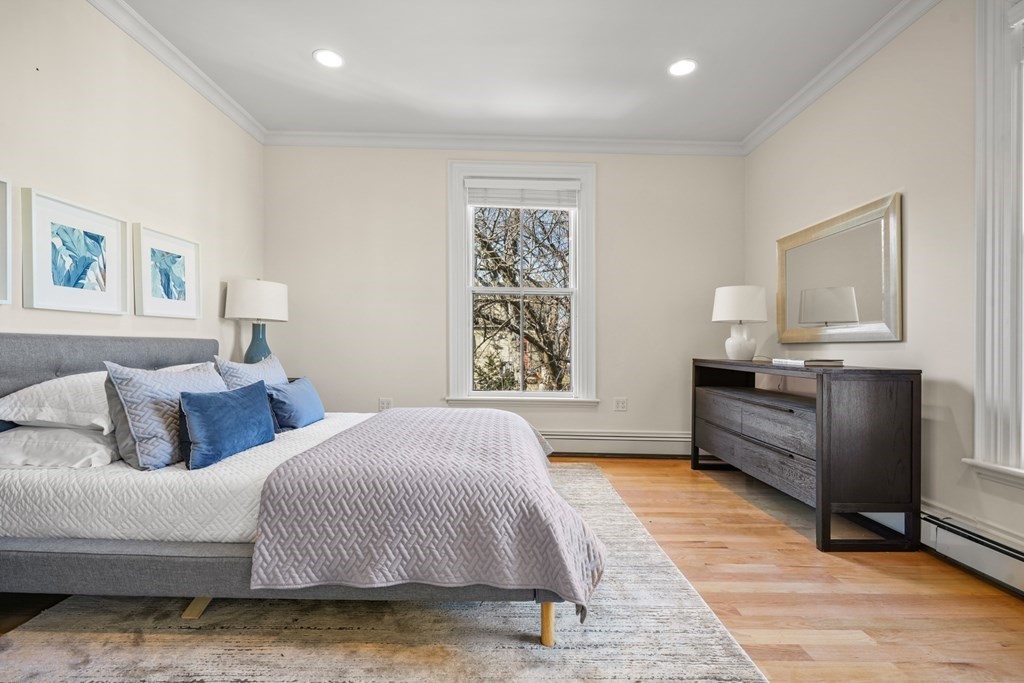 105 Eldredge Street Newton, MA 02458 - Photo 26 of 42 a bedroom with a bed and a window