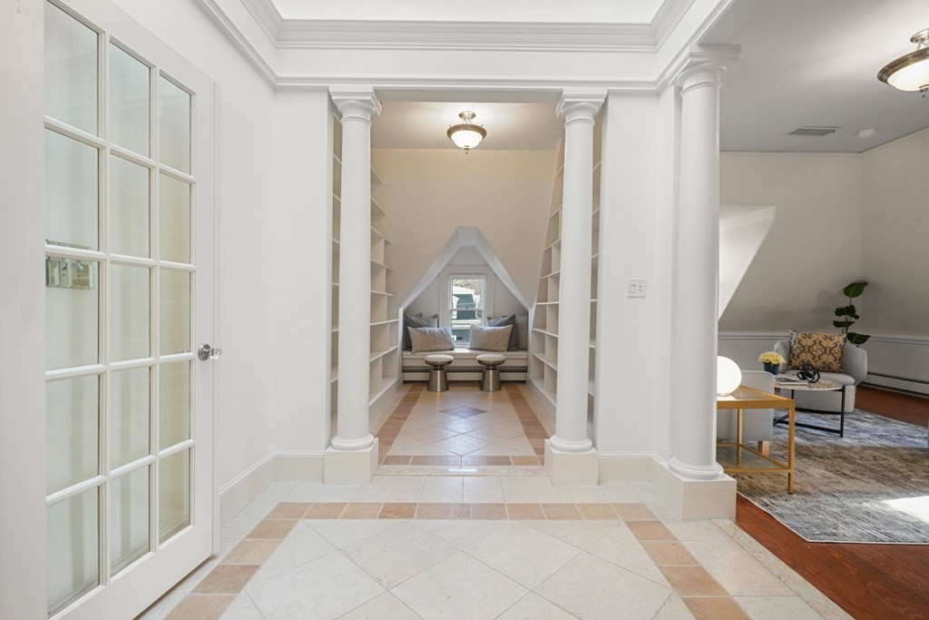 105 Eldredge Street Newton, MA 02458 - Photo 29 of 42 a view of a living room and a livingroom with furniture