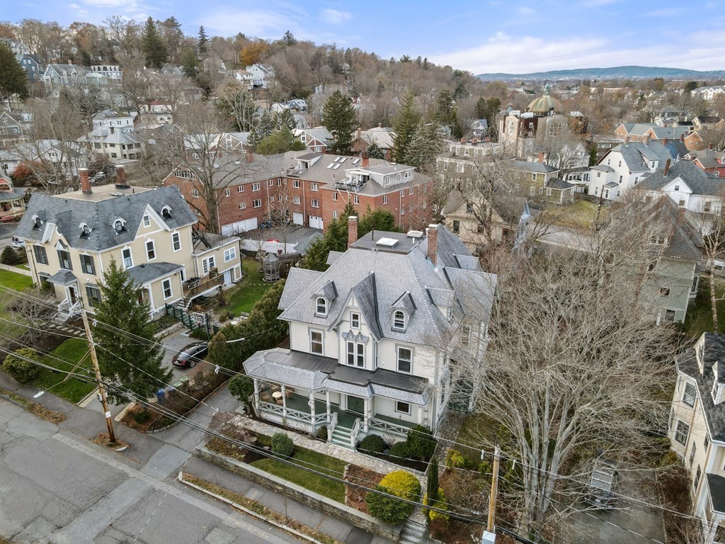 105 Eldredge Street Newton, MA 02458 - Photo 40 of 42 an aerial view of a house with a yard
