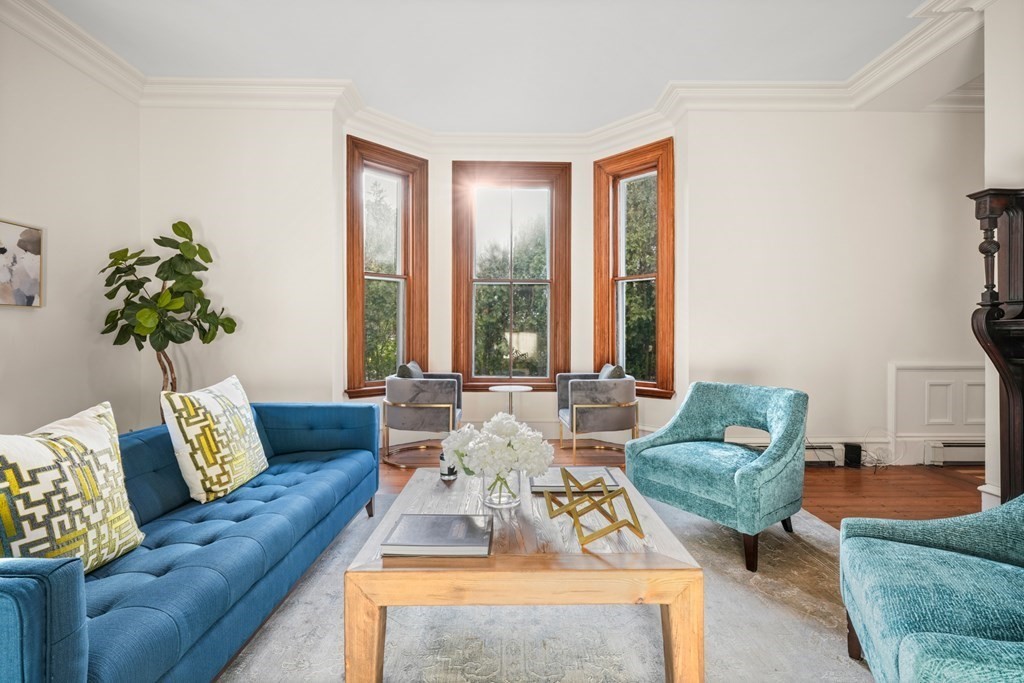 105 Eldredge Street Newton, MA 02458 - Photo 6 of 42 a living room with furniture and a large window