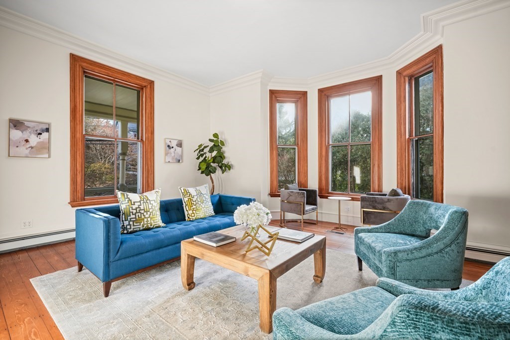 105 Eldredge Street Newton, MA 02458 - Photo 7 of 42 a living room with furniture and a large window
