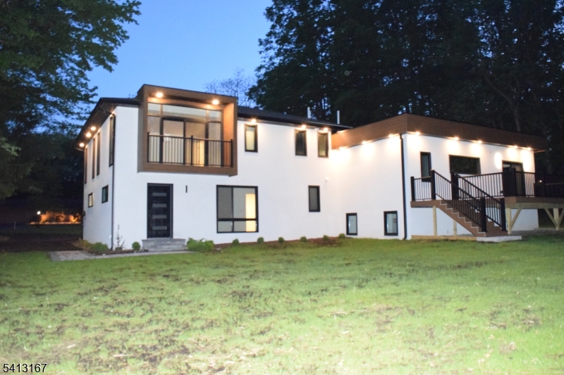 156 Park Road Parsippany, NJ 07054 - Photo 4 of 44 a view of a house with backyard and porch