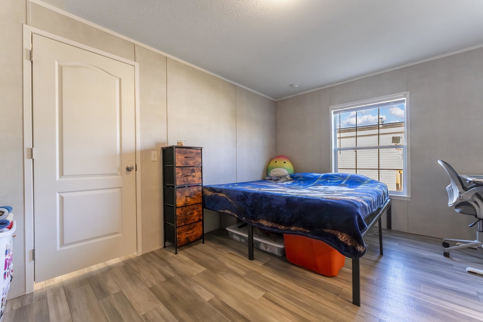 1036 Lunga Drive Round Lake, IL 60073 - Photo 13 of 31 a bed sitting in a bedroom next to a window