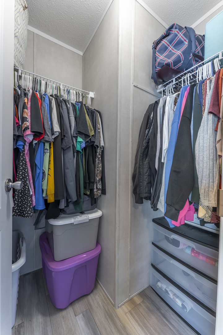 1036 Lunga Drive Round Lake, IL 60073 - Photo 16 of 31 a view of walk in closet with clothes and shoes