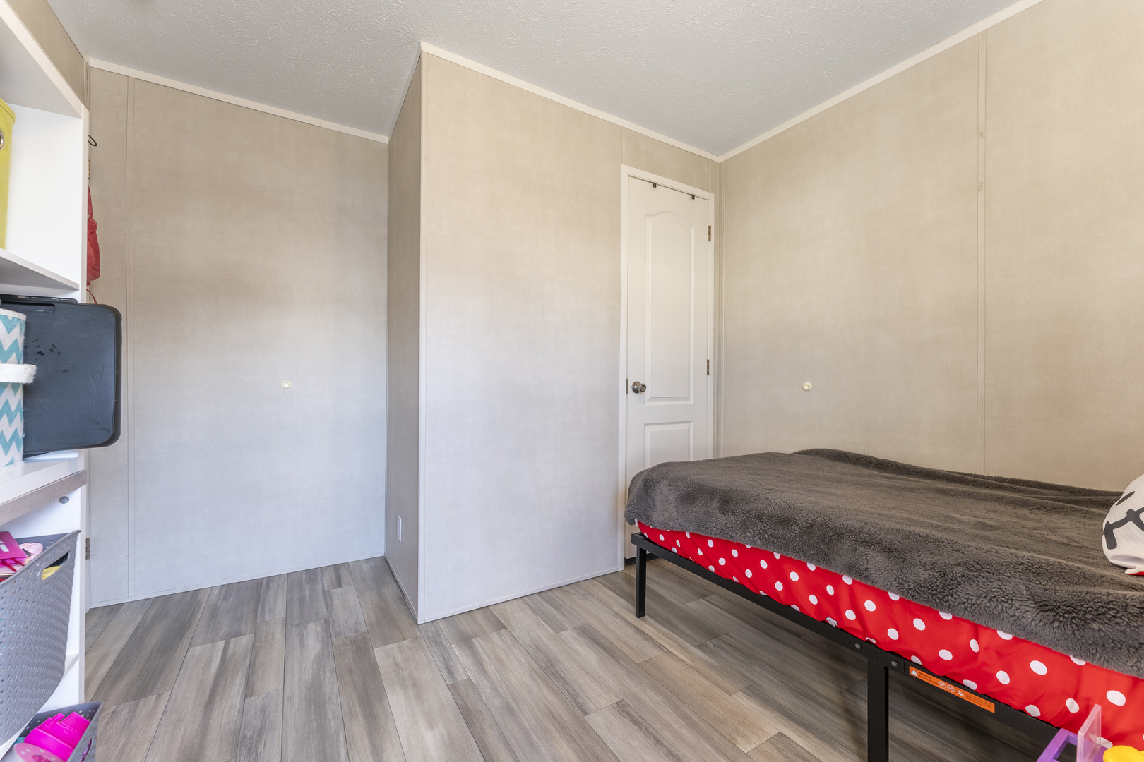 1036 Lunga Drive Round Lake, IL 60073 - Photo 18 of 31 a view of a room with wooden floor and closet