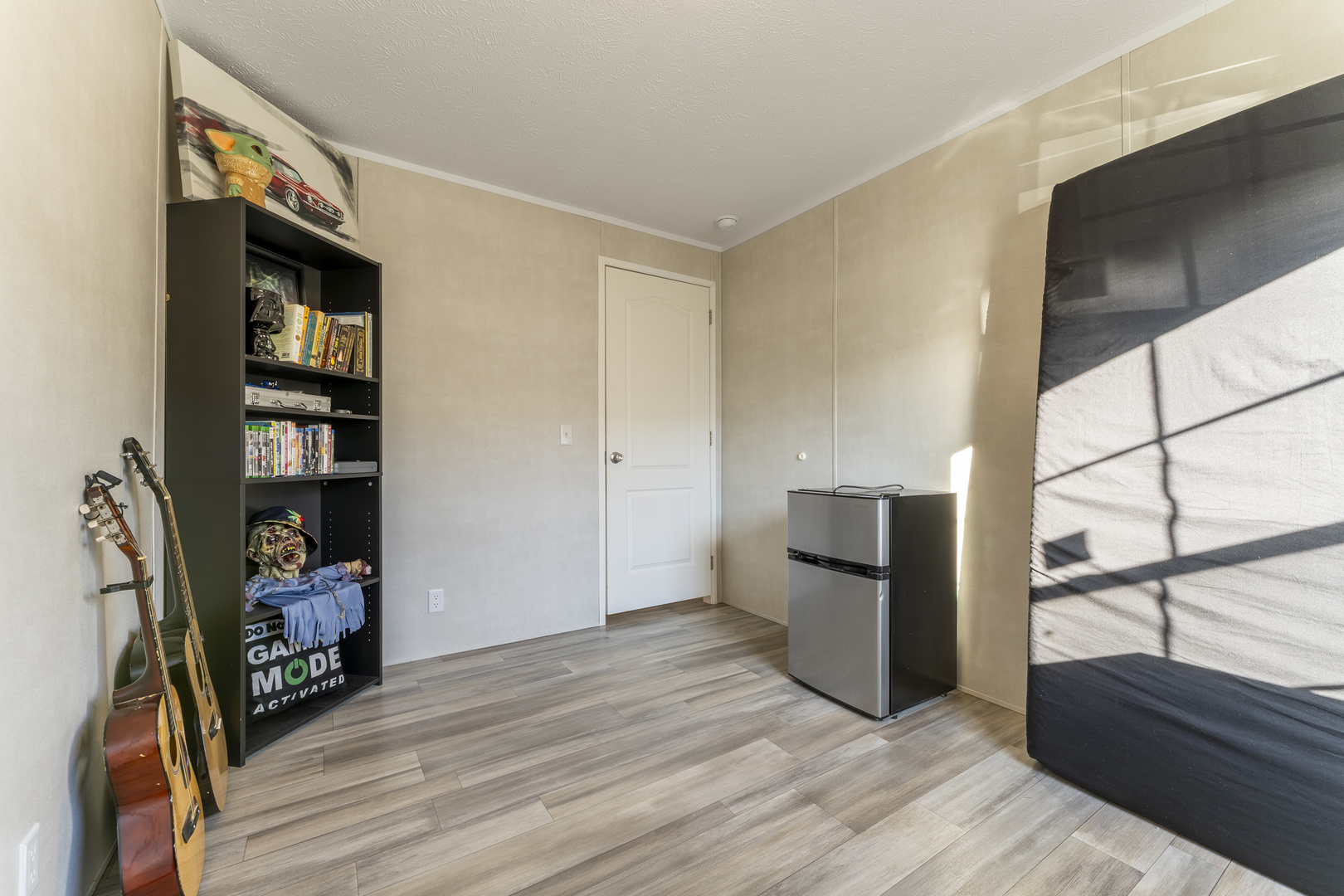1036 Lunga Drive Round Lake, IL 60073 - Photo 21 of 31 a view of a living room with furniture and a flat screen tv