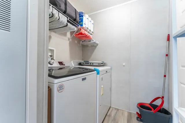 a utility room with dryer and washer