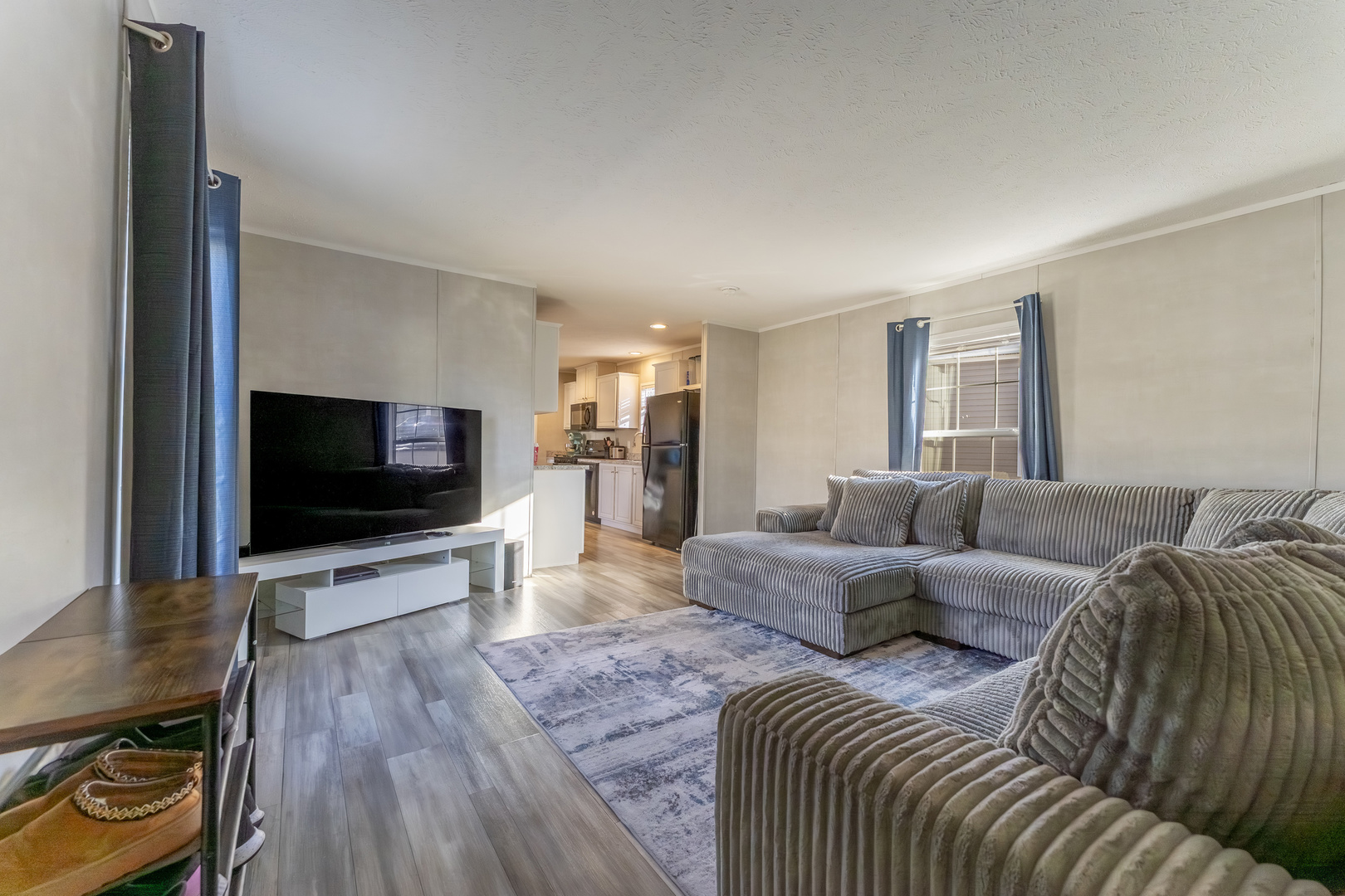 1036 Lunga Drive Round Lake, IL 60073 - Photo 4 of 31 a living room with furniture and a flat screen tv