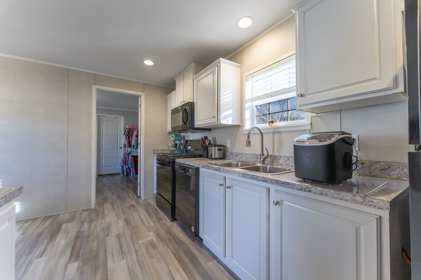 1036 Lunga Drive Round Lake, IL 60073 - Photo 8 of 31 a kitchen with a refrigerator and a stove top oven