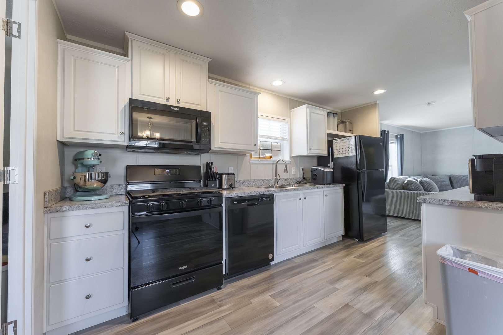 1036 Lunga Drive Round Lake, IL 60073 - Photo 10 of 31 a kitchen with a refrigerator stove and microwave