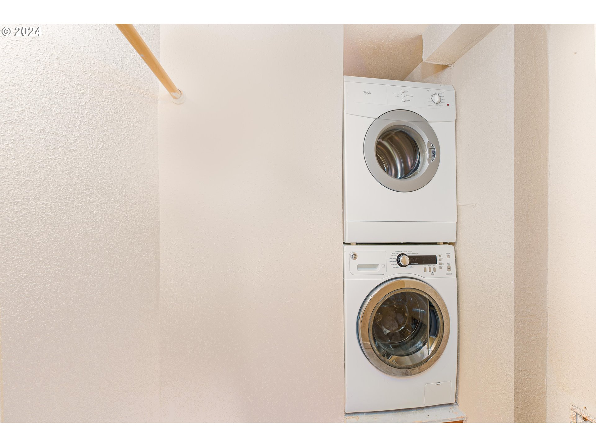 2034 Northwest Overton Street, Unit E Portland, OR 97209 - Photo 18 of 25 a view of washer and dryer in a utility room