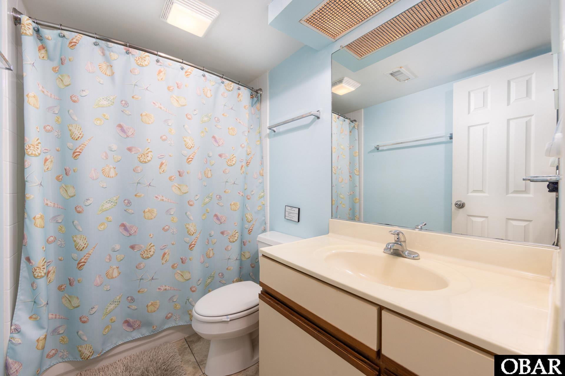 8111 South Old Oregon Inlet Road, Unit B201 Nags Head, NC 27959 - Photo 23 of 35 Full Hallway Bathroom
