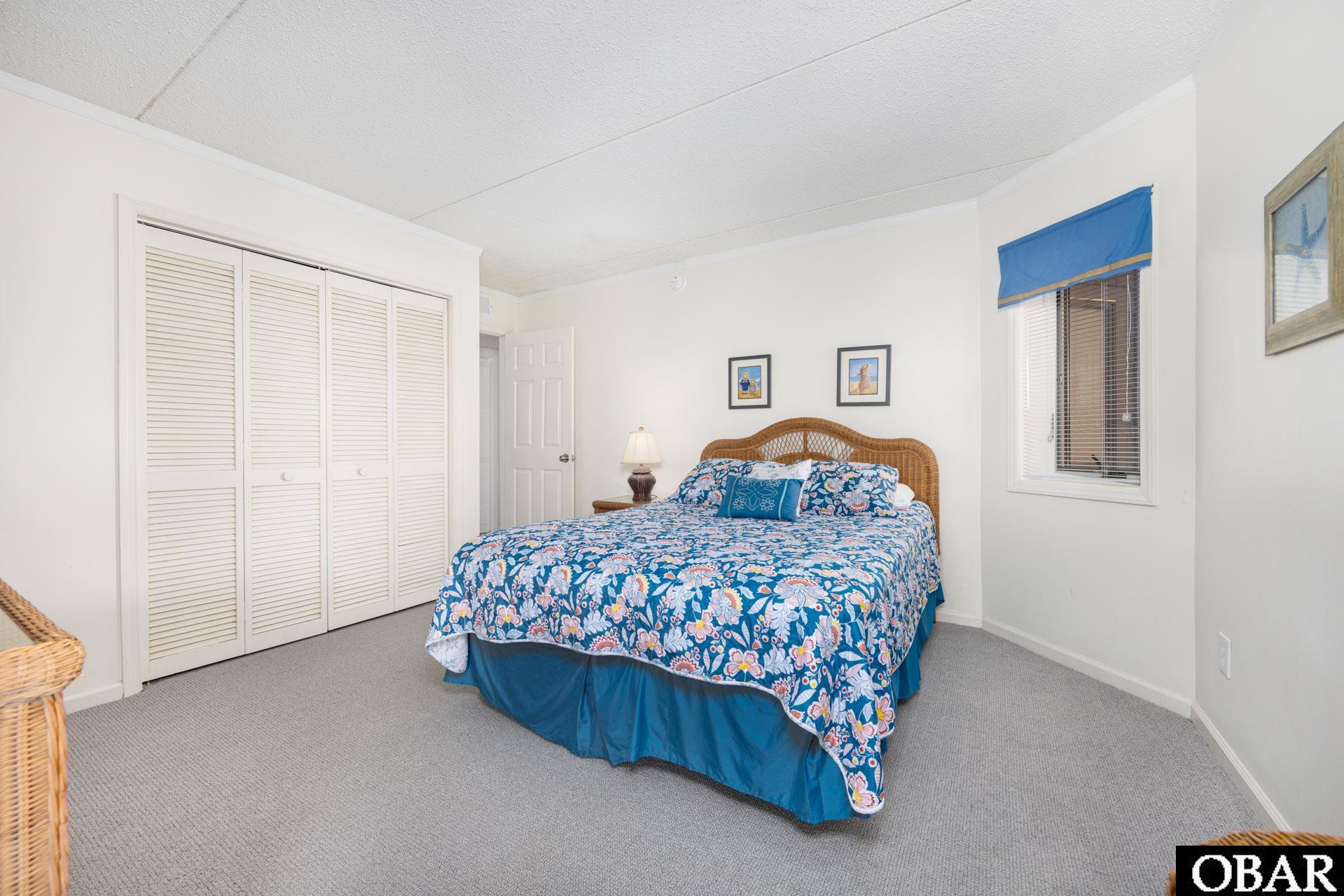 8111 South Old Oregon Inlet Road, Unit B201 Nags Head, NC 27959 - Photo 24 of 35 Bedroom #3 Queen Bedroom