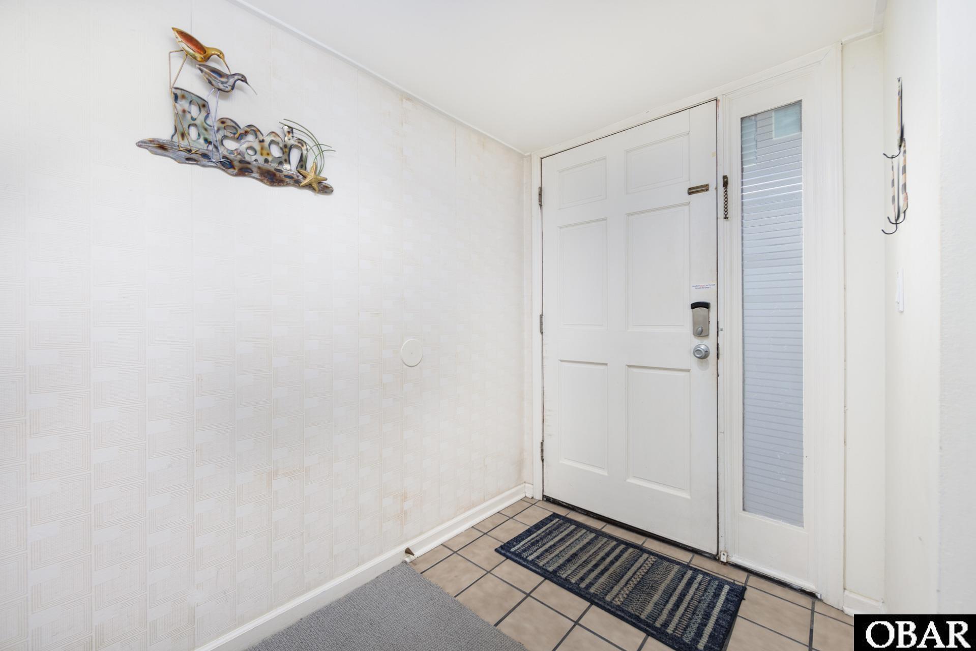 8111 South Old Oregon Inlet Road, Unit B201 Nags Head, NC 27959 - Photo 4 of 35 Foyer